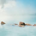 Woman floating in the Blue Lagoon 