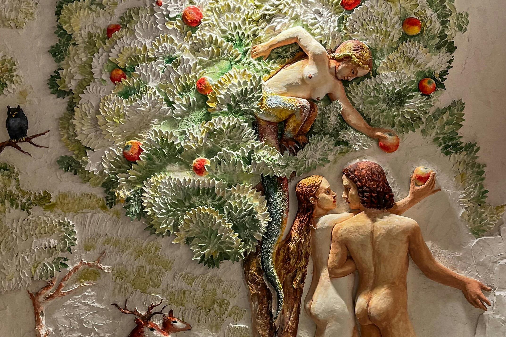 イブが禁断の果実を受け取る生命の樹の一部