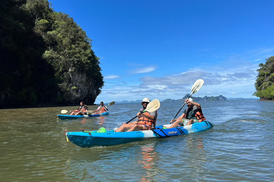 Continue paddling your kayak and you'll find a narrow channel that changes from mangrove forest to limestone mountains, passi