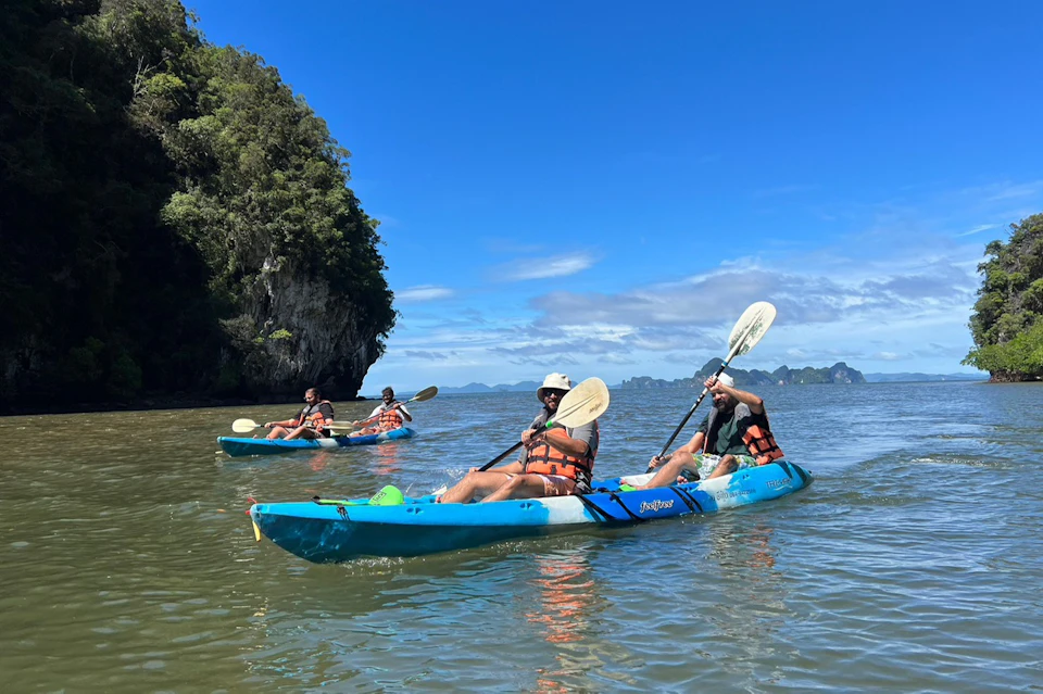 Continue paddling your kayak and you'll find a narrow channel that changes from mangrove forest to limestone mountains, passi