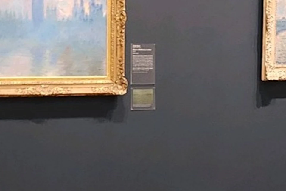 Guide discussing Monet's London paintings