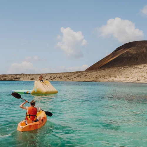 La Graciosa: Guided Catamaran Cruise + Ferry Ride + Transfer from Lanzarote