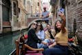 Discover Venice from the waterfront during a 30-minute gondola ride