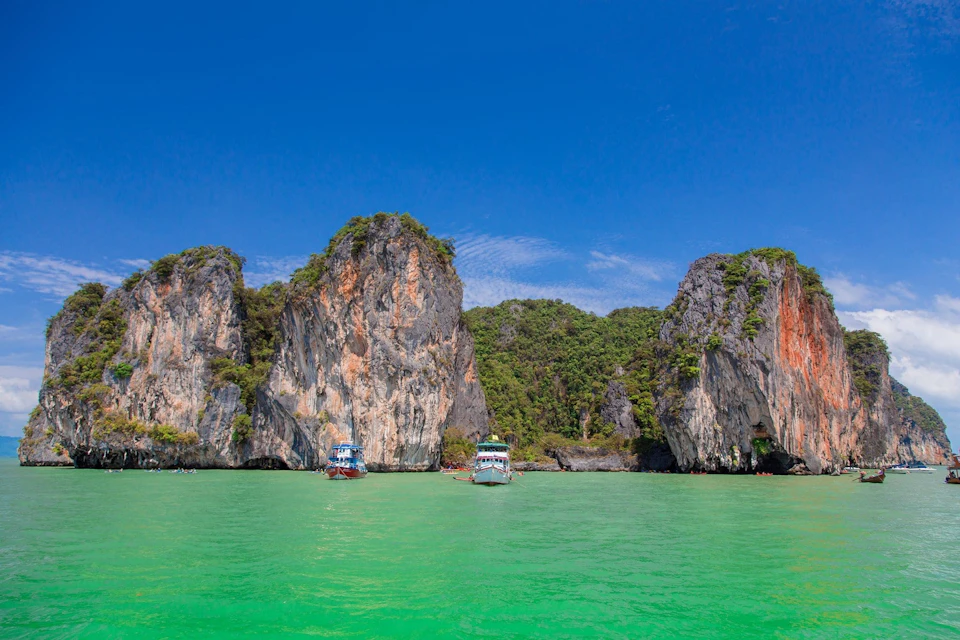 Speed through Phang Nga Bay, enjoying the scenic ocean views.
