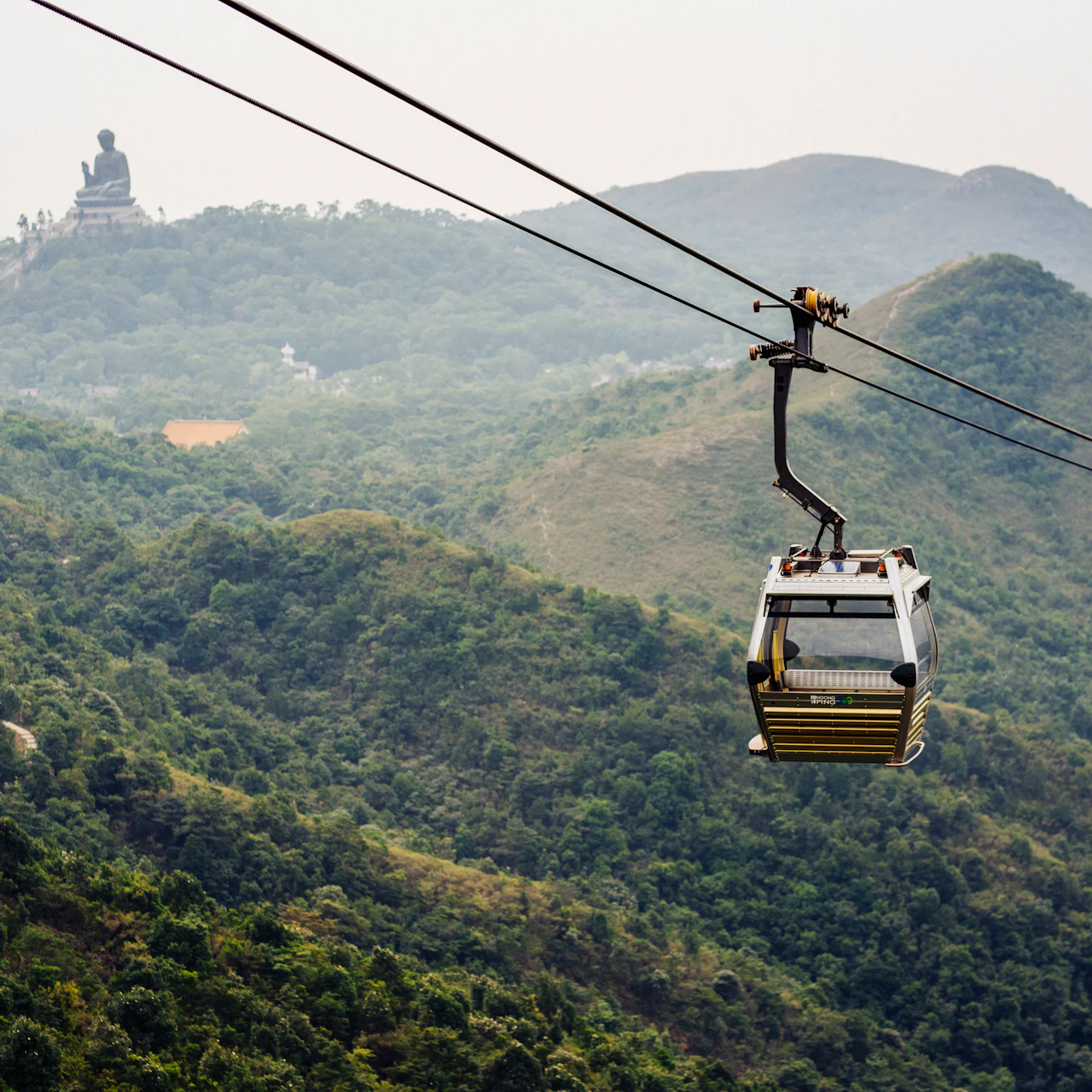 Ngong Ping Cable Car Roundtrip: One-way Standard + One-way Crystal Plus Cabin in Lantau Island β Tiqets
