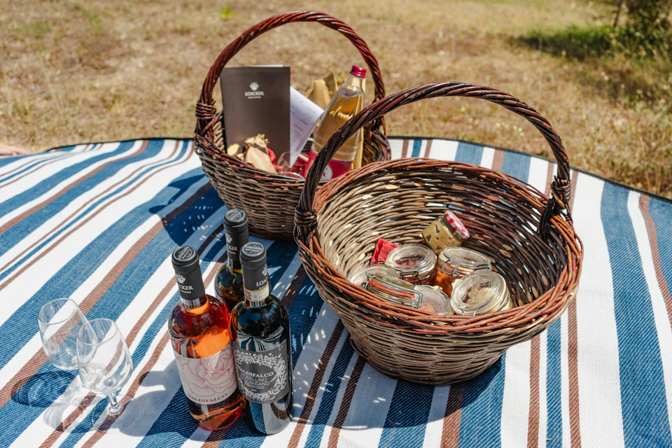 picnic basket with one bottle of wine