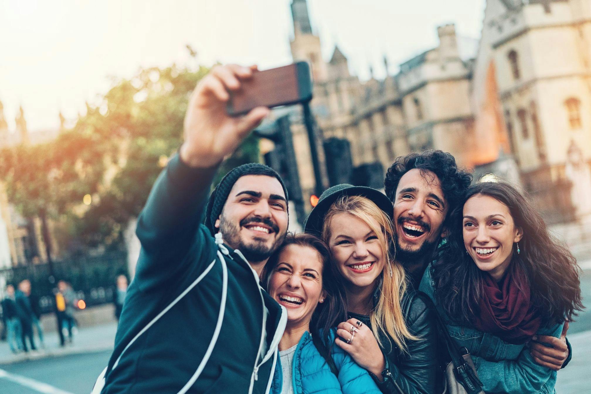 Taking a selfie with friends