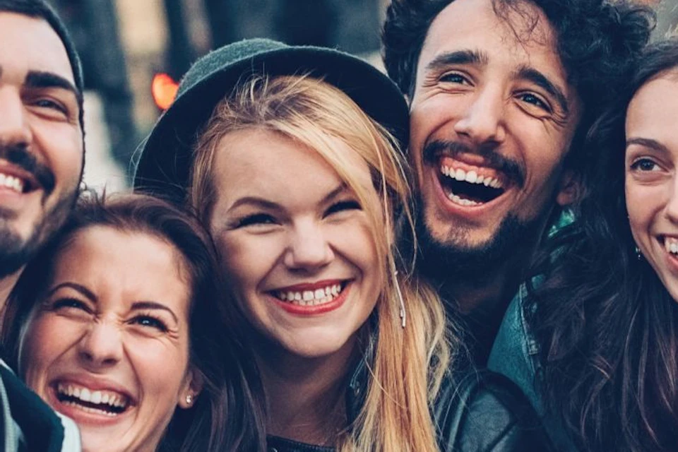 Taking a selfie with friends