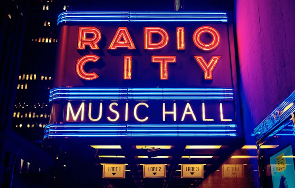 neon sign of radio city music hall
