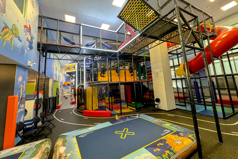 Dive into the ultimate adventure with the supplier's interactive trampoline zone, multi-level jungle gym, and a massive obsta