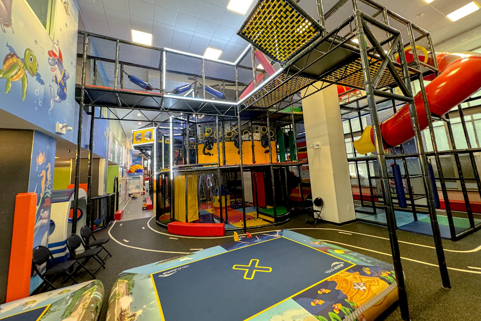 Dive into the ultimate adventure with the supplier's interactive trampoline zone, multi-level jungle gym, and a massive obsta