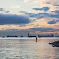 Sunset paddler at English Bay