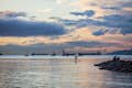 Sunset paddler at English Bay