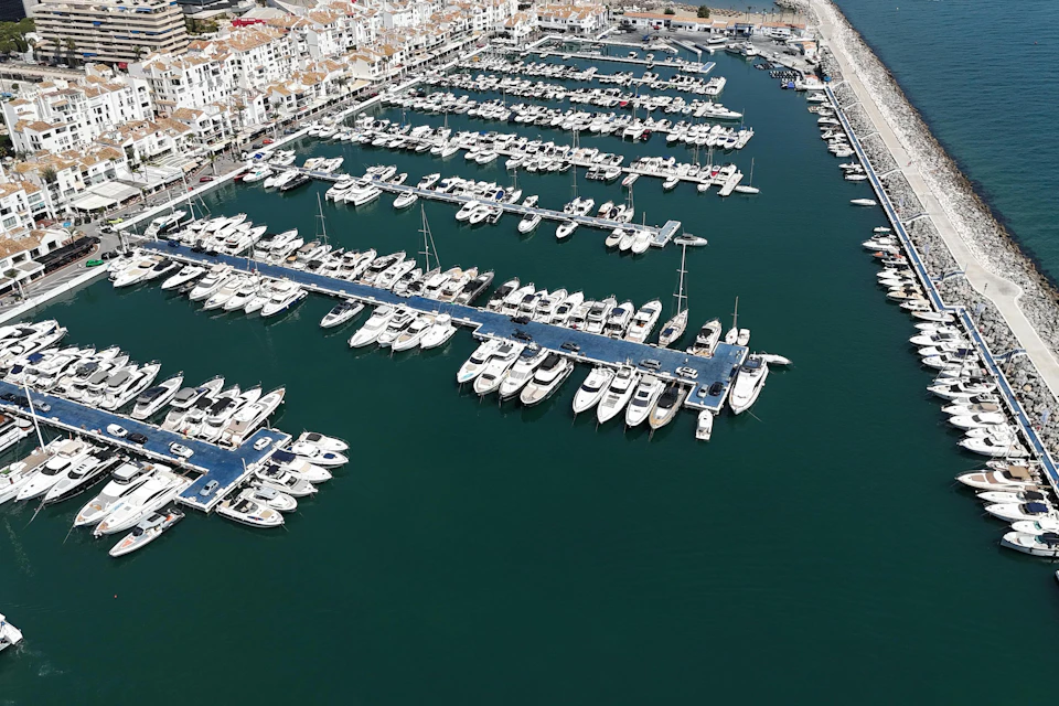 Aerial view of luxury yachts at Puerto Banús marina, Costa del Sol
