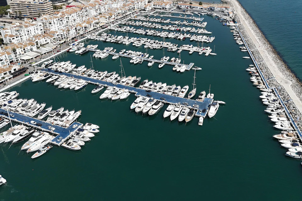 Aerial view of luxury yachts at Puerto Banús marina, Costa del Sol