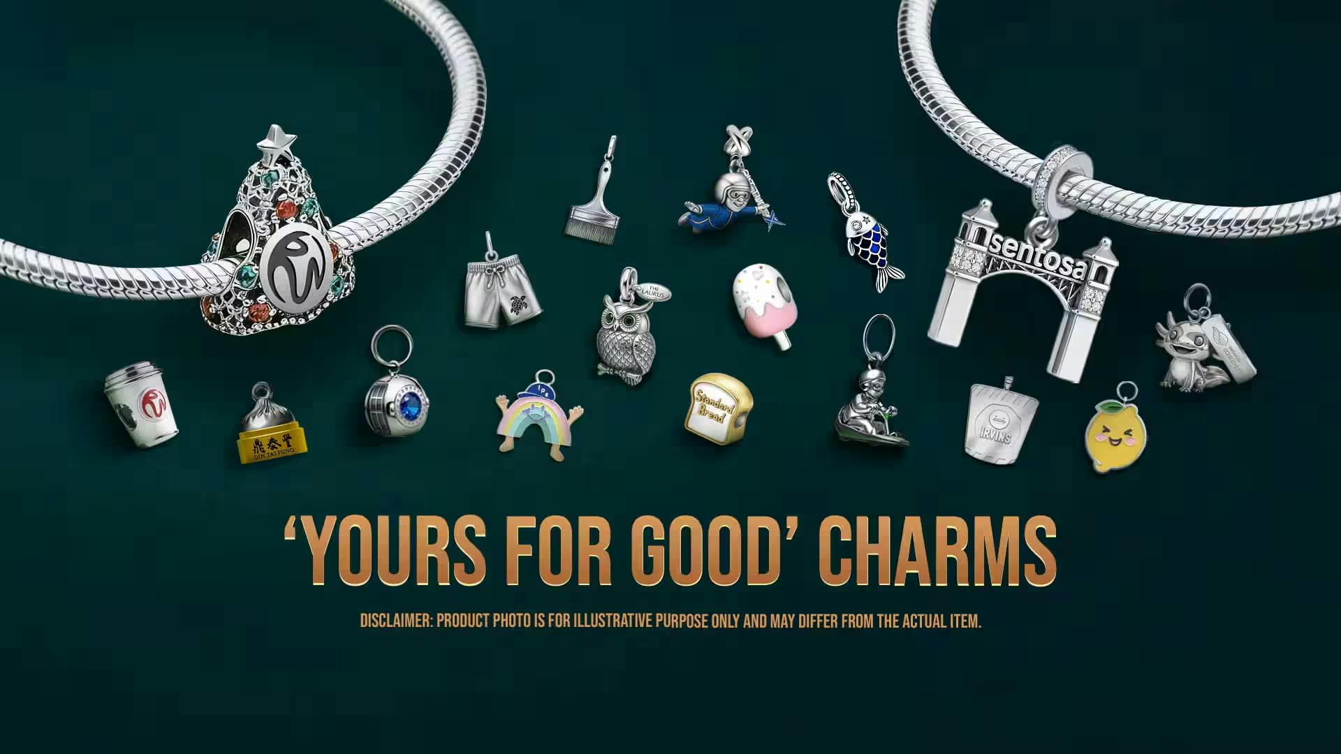Una colección de colgantes y pulseras decorativas sobre fondo oscuro con el texto "Yours For Good Charms".