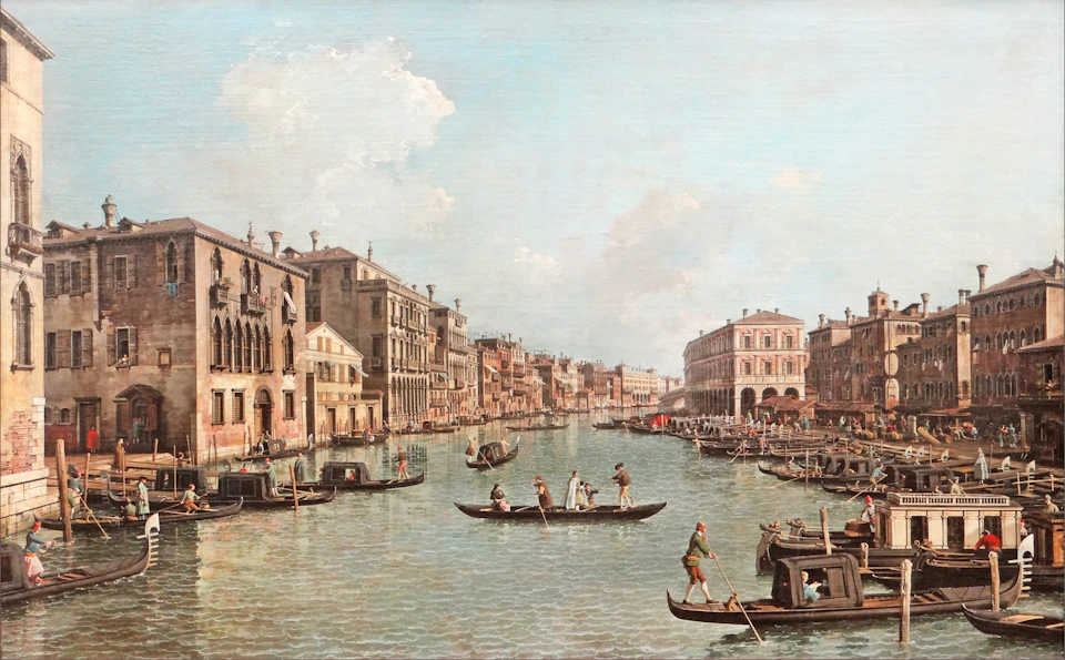 A historical painting of Venice's Grand Canal with gondolas and rowboats, ornate buildings on both sides, and a partly cloudy sky.
