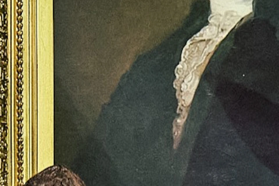 A woman in period costume stands behind a desk with papers flying, in a room with a portrait of George Washington on the wall.
