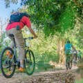 We ride through the hidden dirt trails to escape the main roads. Get off the beaten track with the full day of cycling. 