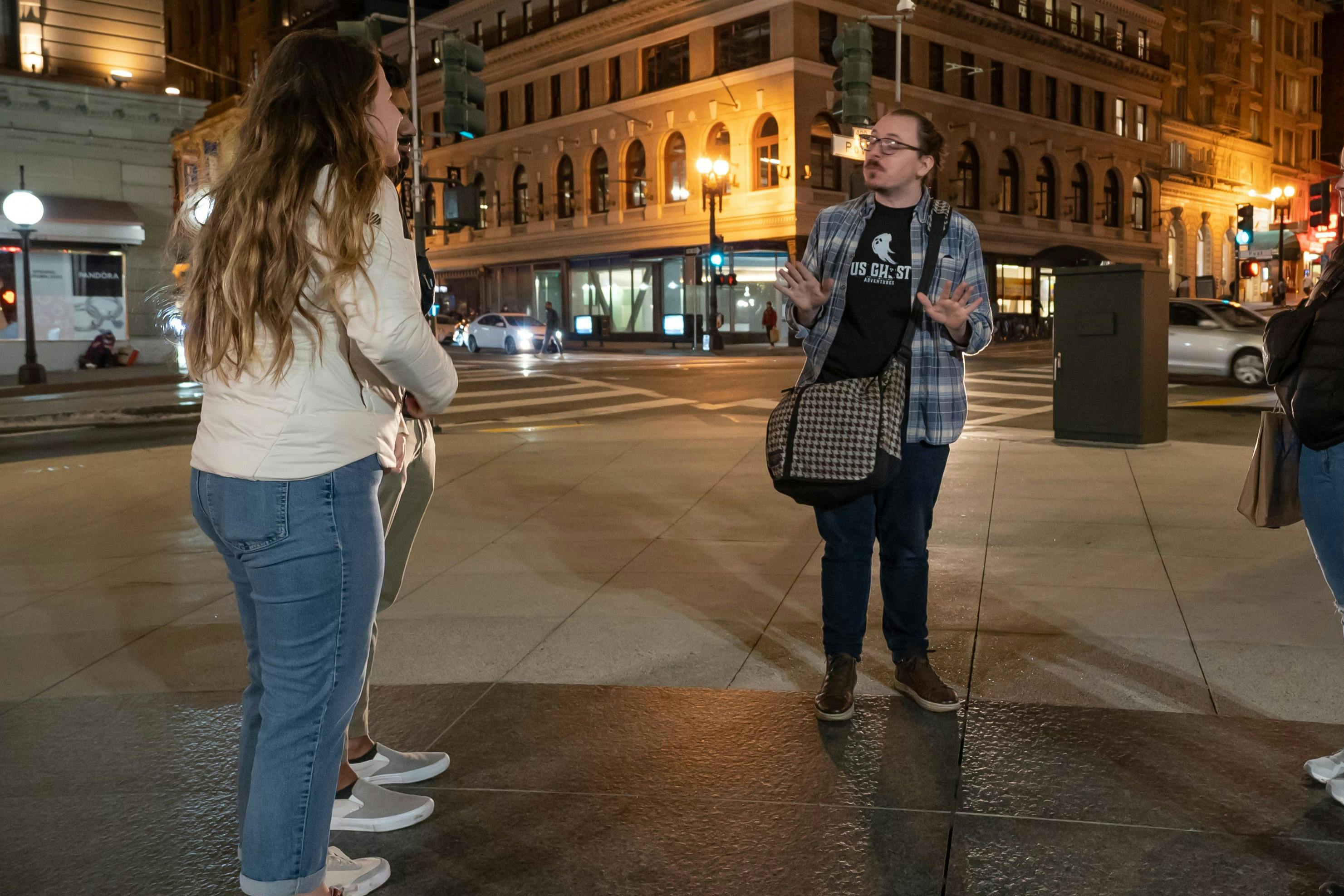 A tour guide sharing tales with guests