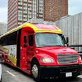 Chicago Crime Tour Bus on the Move in the Windy City