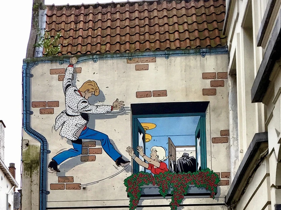 Colorful mural of a man climbing a wall towards an open window, where a woman with blonde hair reaches out to him.