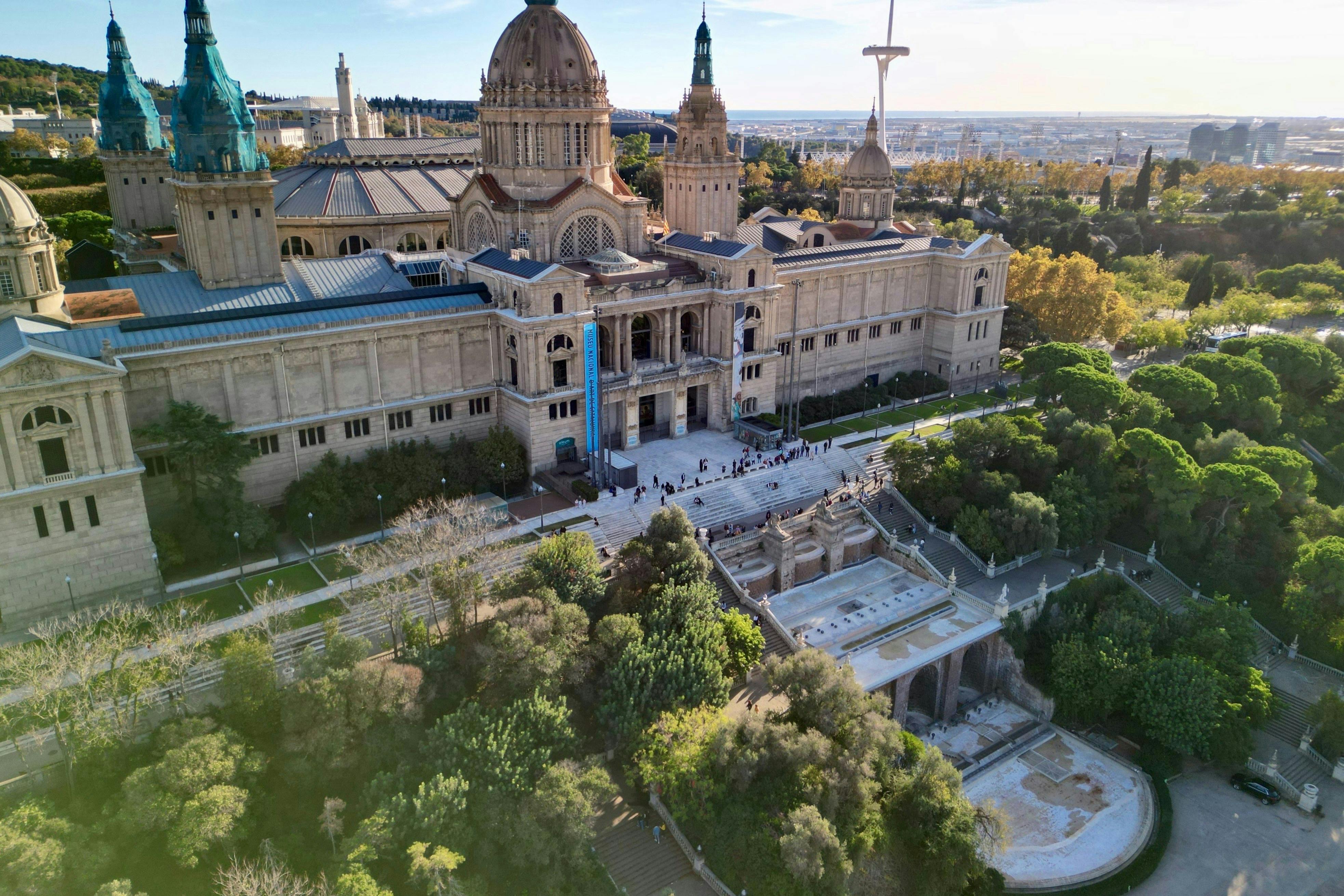Aerial view of the National Palace (MNAC) and Montjuïc Communications Tower in the background