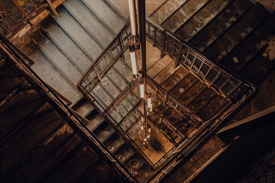 The historic staircase at Fotografiska in Berlin, which is heritage protected from the building's time as an artist squat.