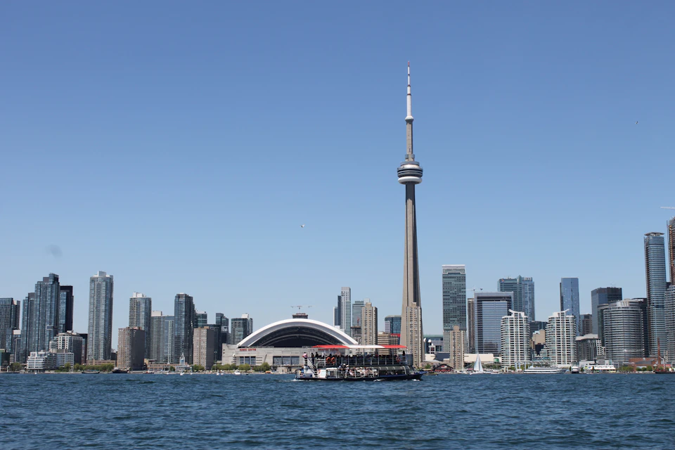 The Harbour Star cruising the inner Toronto Harbour. Toronto skyline in the background showing the CN Tower and Rogers Centre