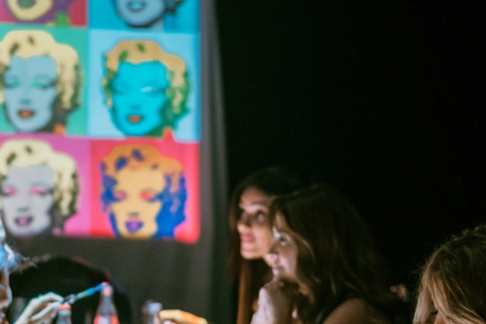 Guests enjoying Seven Paintings immersive dining show