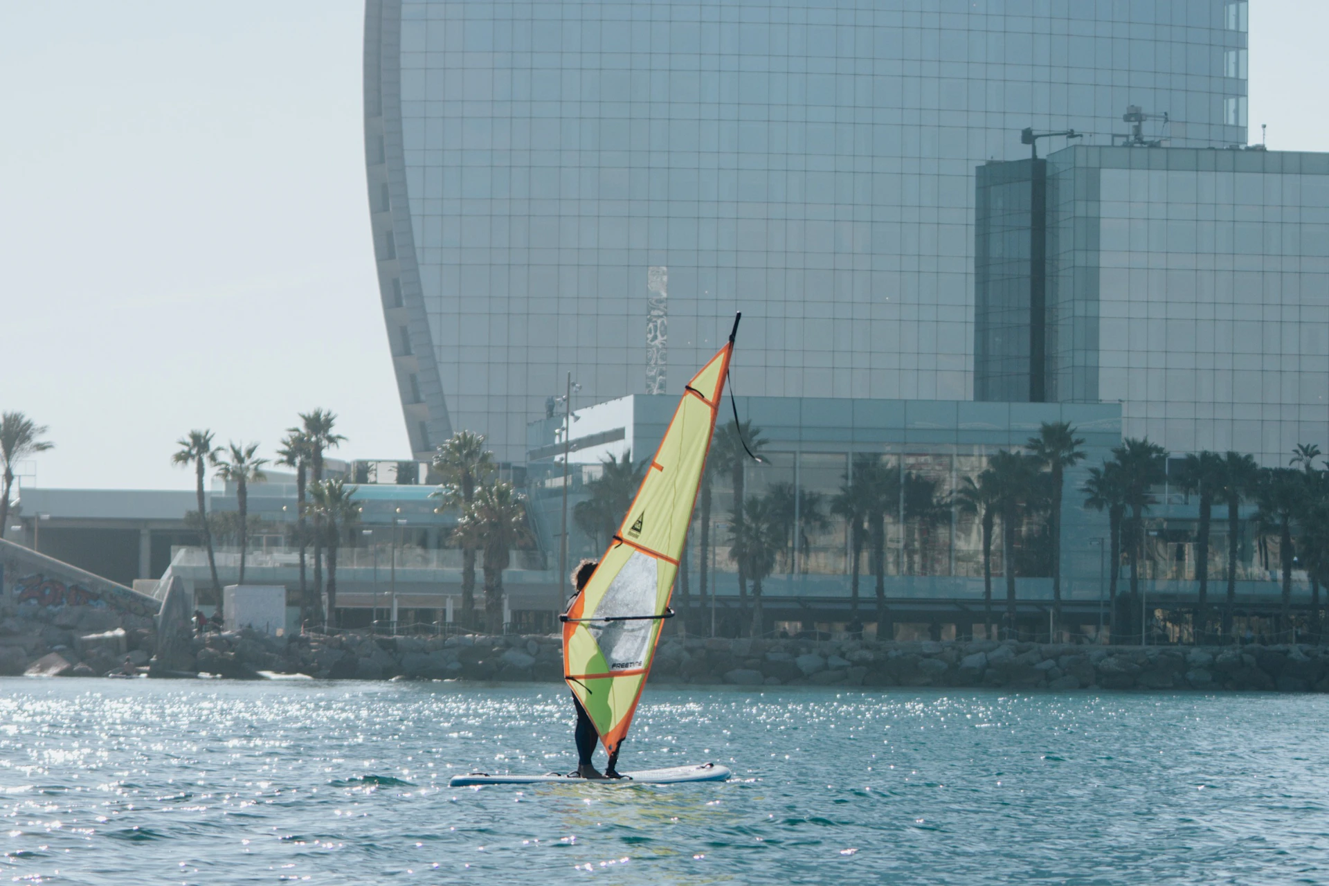 People practicing windsurfing