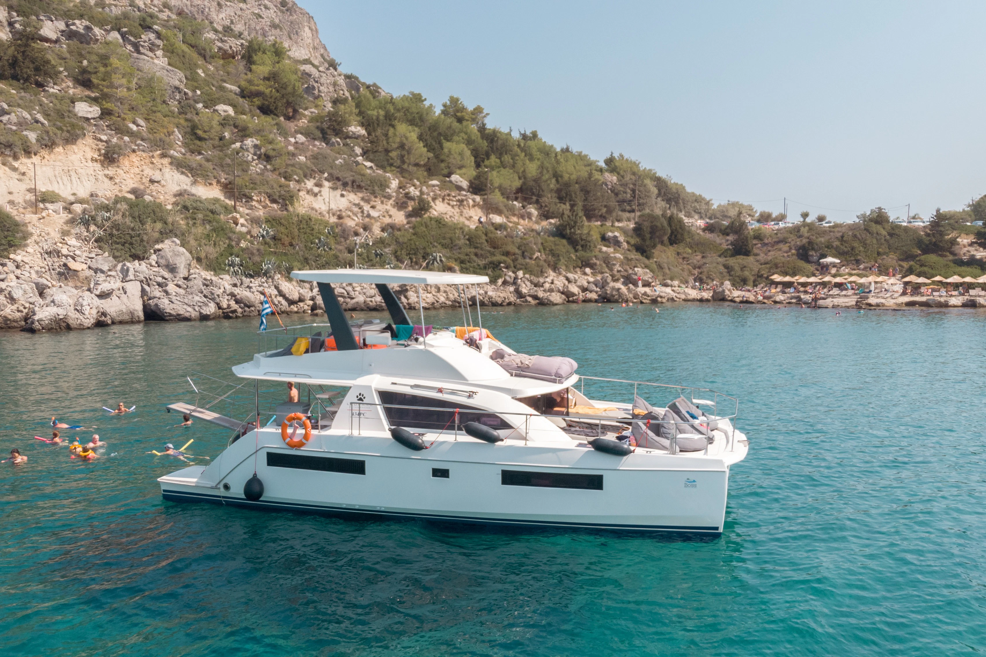 Rhodes: Power Catamaran Day Cruise with Lunch