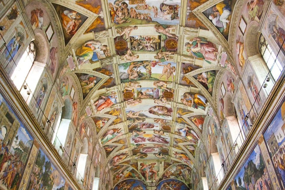 Witness how Michelangelo’s jaw-dropping fresco overtakes the entire altar wall of the Sistine Chapel.