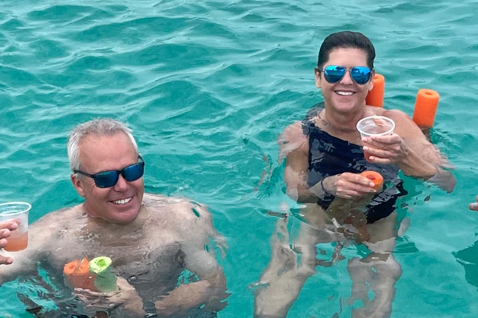 Guest having a cocktail in the water