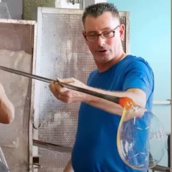 One of the guests blowing the glASS