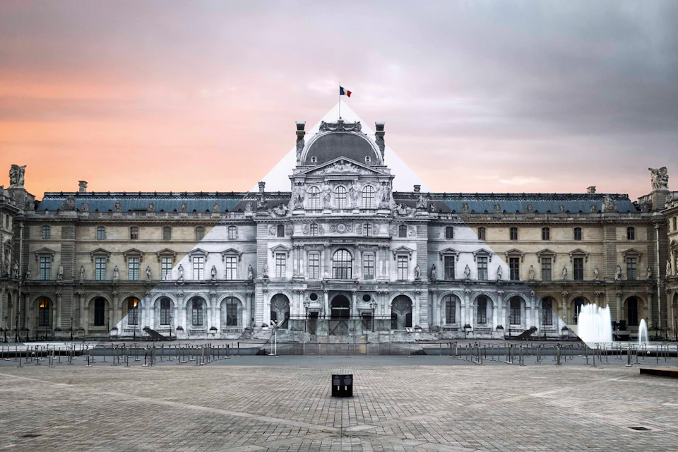A historical building with a French flag on top and an artistic overlay of a black-and-white image over its central section.