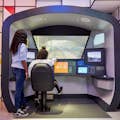 Esperienza interattiva di guida del treno nella galleria Future Engineers