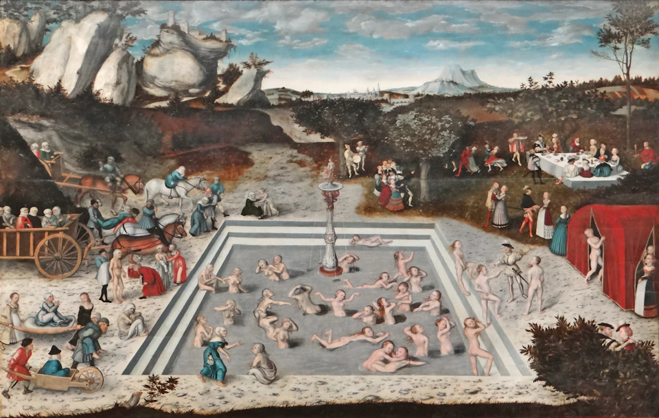 An ancient bath scene with numerous nude figures in a pool, surrounded by people on horseback and others engaging in conversation.