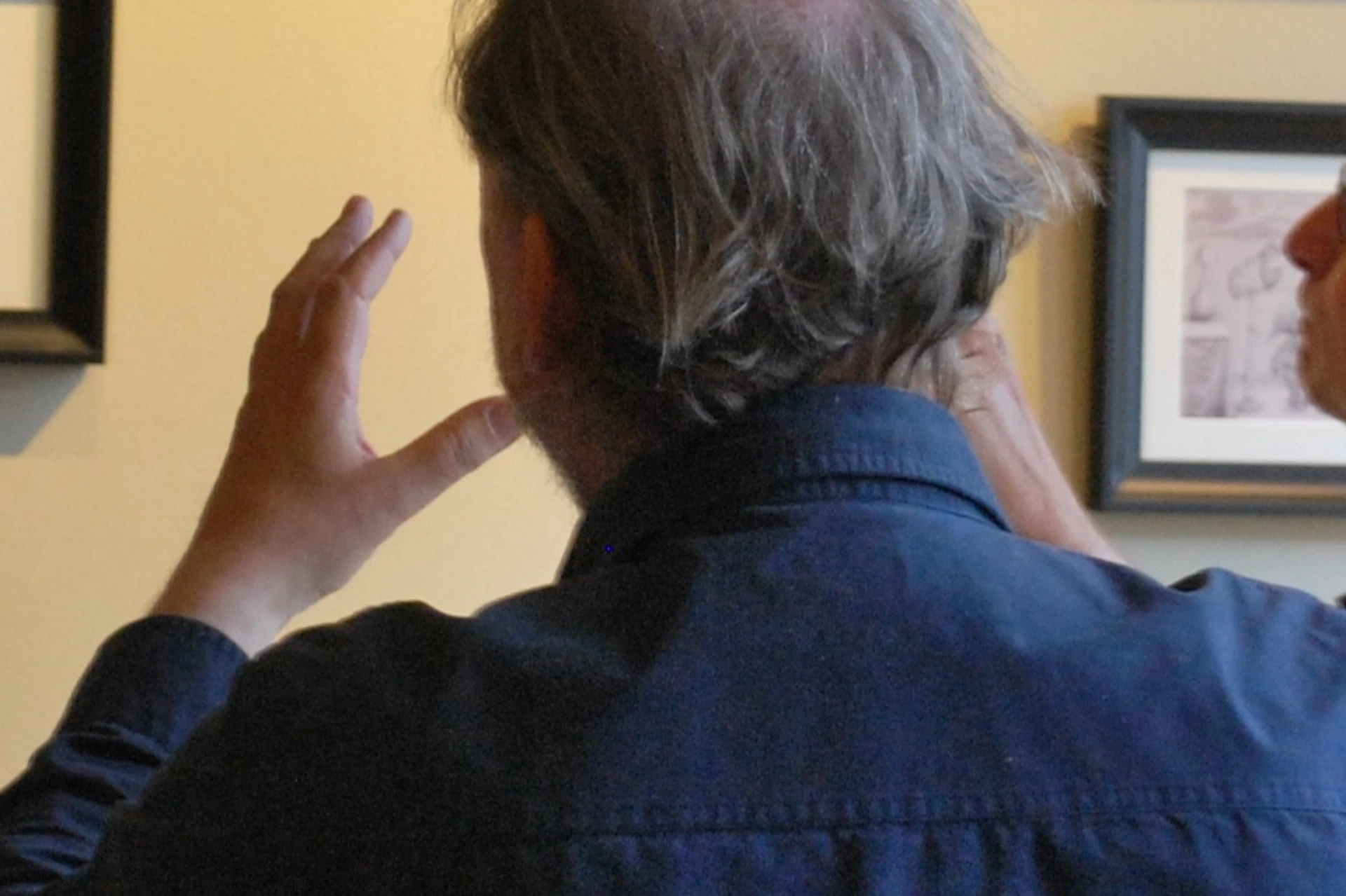 Discussion over images at the Embassy of the Free Mind