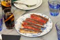 Delicious anchovy and tomato tapas, a highlight of the Eixample food tour experience.