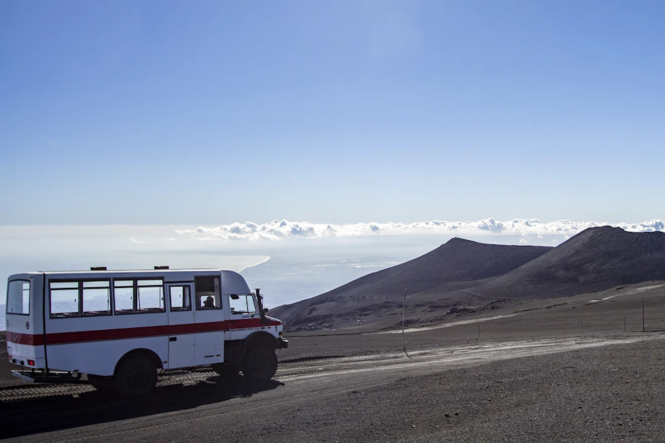 4x4 bus and Ionian coast below