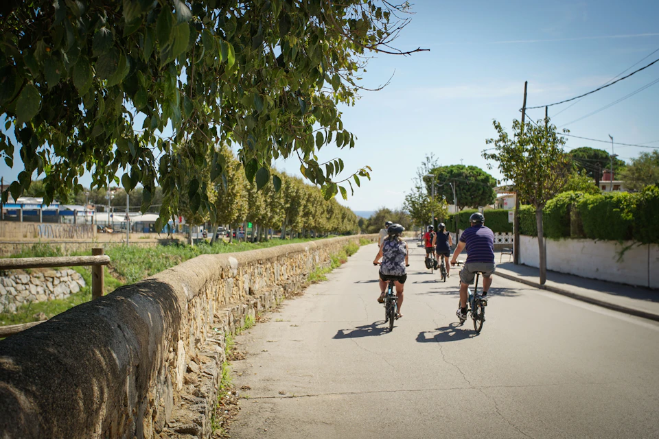 Ride the e-bike to the winery along the coastline and small villages
