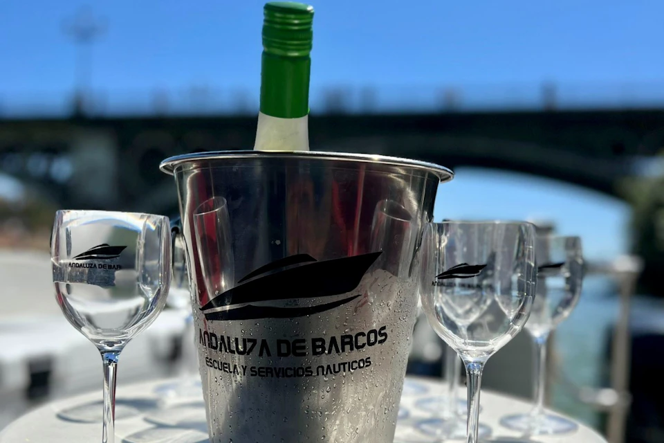 Wine glasses, ice bucket, and bottle of wine