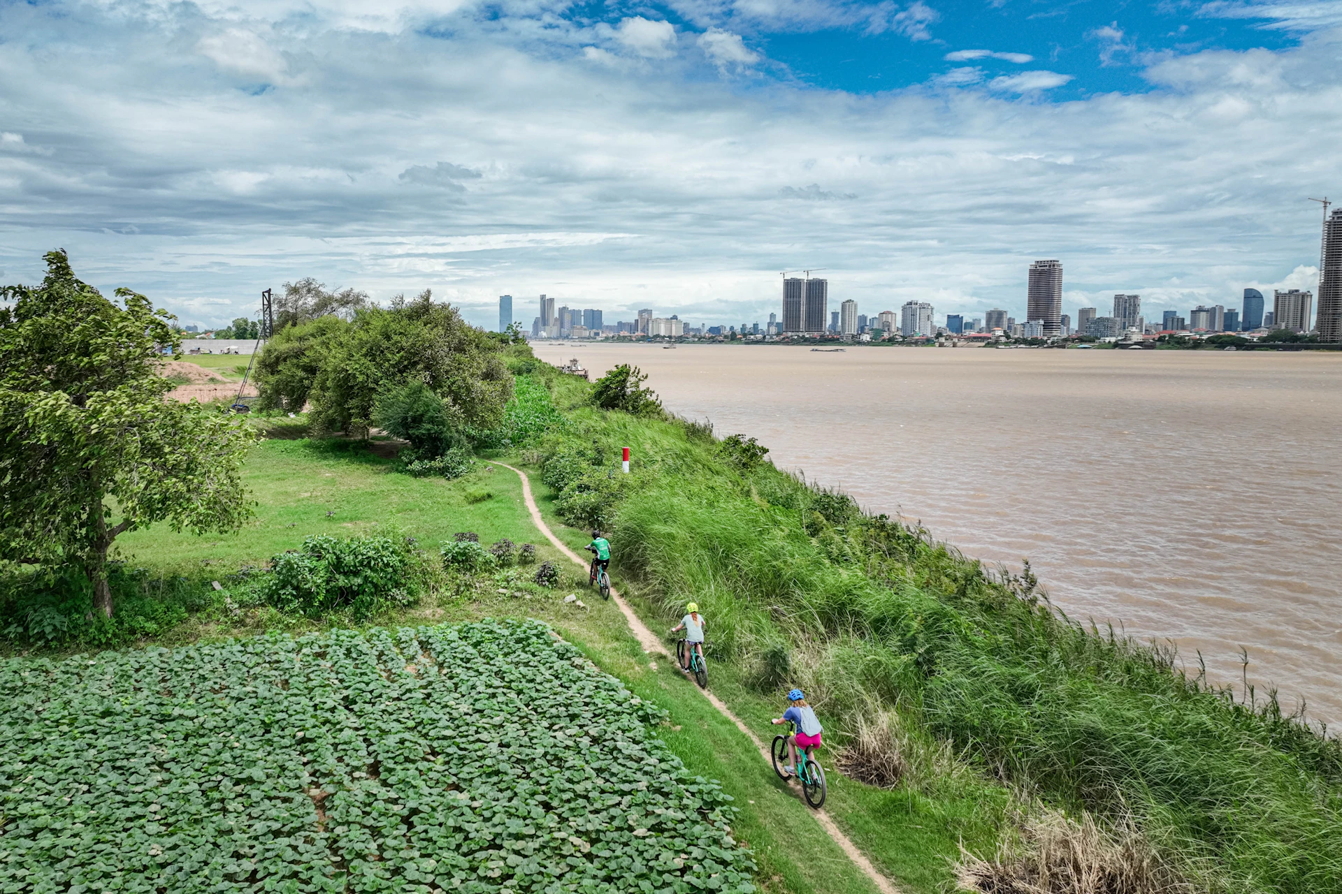 Ride your bike along the Mekong trail and experience the unique culture, beautiful landscapes, and lively local life.