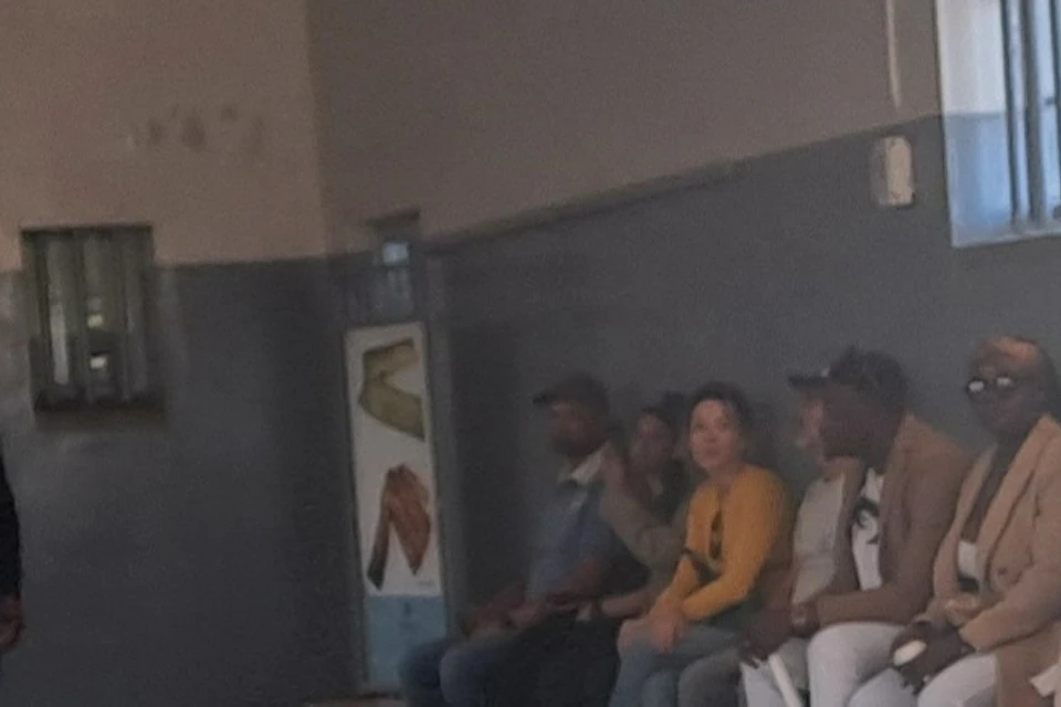 visitors are listening to the former inmate sharing his Robben Island experience