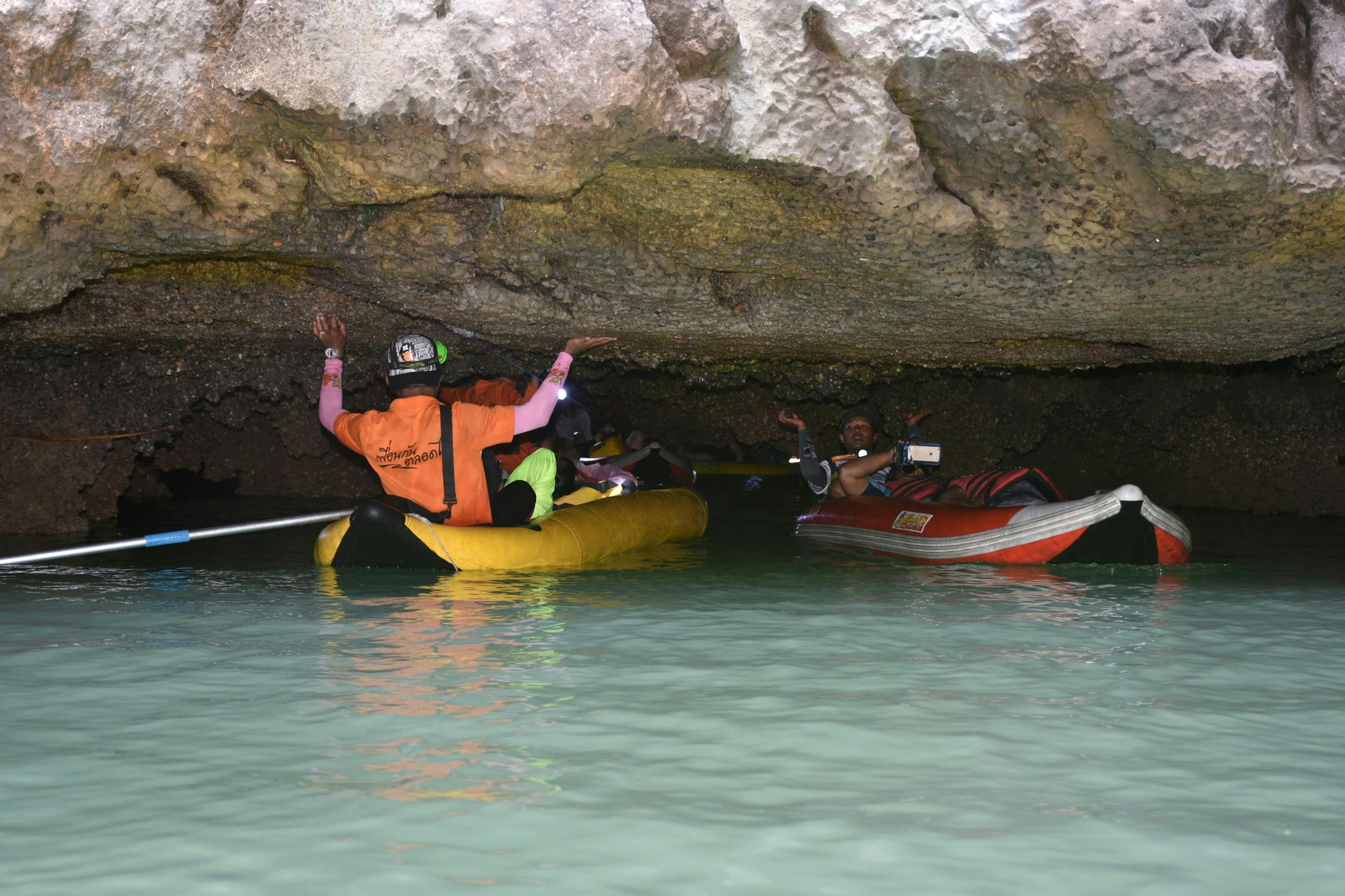 Enter narrow channels deep under the limestone rock