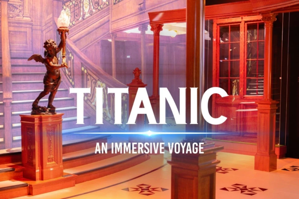 A decorative staircase with wood paneling and ornate details, overlaid text reads "Titanic: An Immersive Voyage."