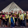 the group in front of the Louvre pyramid