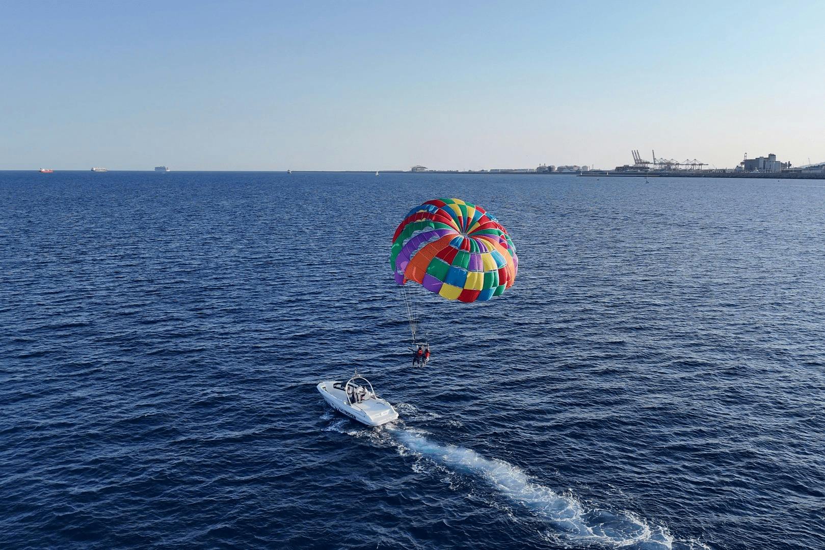 drone image of the balloon taking off and flying with customers.