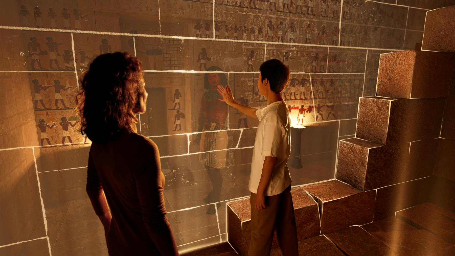 两个人，一个人触摸显示古埃及象形文字和插图的透明屏幕，附近有石块。